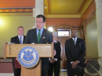 Gov. Dannel P. Malloy with his two most recent nominees to the Appellate Court, Elliot Prescott and Raheem Mullins. The latter was Malloy's youngest appointee.