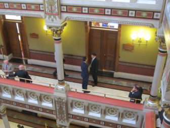 Gov. Dannel P. Malloy conferring with Sen. John Fonfara.