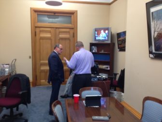 House Majority Leader Joe Aresimowicz, right, in House Minority Leader Lawrence F. Cafero's outer office.