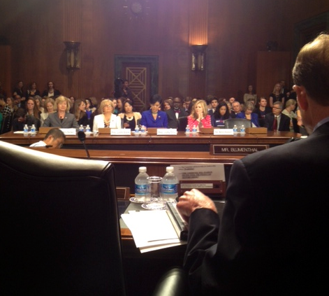 Looking over Connecticut Sen. Richard Blumenthal's shoulder at a hearing on abortion laws.