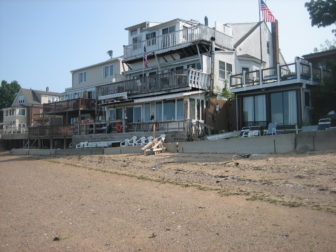Morris Cove in New Haven has been approved for nearly $2 million in federal Sandy funding to build a seawall where temporary Jersey barriers protect three houses now and for another seven houses beyond that. But not only is the project controversial, it will also be a race against the clock to meet the time limit on those funds.