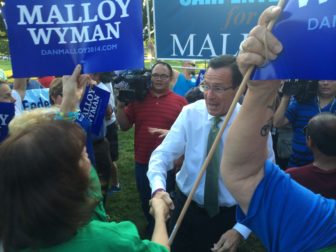 Gov. Dannel P. Malloy greeted by union supporters outside the Norwich Free Academy.