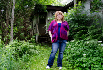 Sarah Engle stands outside the home where she and her mother were shot by Engle's ex-boyfriend, James Lahoud, in 2008. Engle's mother, Charlotte Engle, was killed.