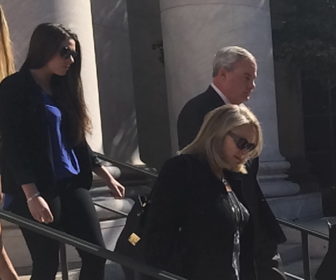 John G. Rowland departs with his wife, Patty, and a daughter after guilty verdict.