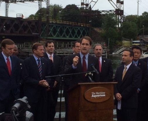 At the Walk Bridge in Norwalk Thursday were, left to right, U.S. Sen. Chris Murphy U.S. Sen. Richard Blumenthal; State Rep. Chris Perone of Norwalk, D-137th; Gov. Dannel P. Malloy; U.S. Rep. Jim Himes at podium; State Rep. Jonathan Steinberg of Westport, D-136th; State Sen. Bob Duff of Norwalk, D-25th; and State Rep. Tony Hwang of Fairfield, R-134th.