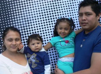 Jose Luis Piscil, an undocumented worker from New Haven, with his family in Washington, D.C., Thursday.