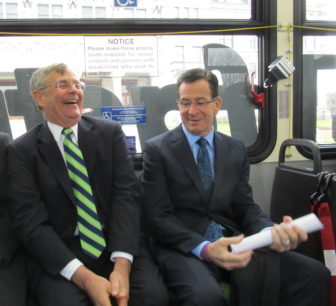 Gov. Dannel P. Malloy and Transportation Commissioner James Redeker share a laugh at start of CT fastrak tour. (file photo)