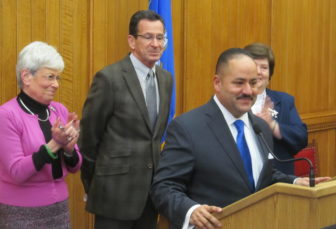 Andres Ayala Jr. with Gov. Dannel P. Malloy, Lt. Gov. Nancy Wyman and Melody Currey.