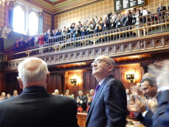 Sen. Andrew Maynard receives a lengthy standing ovation after he entered the chamber to be sworn in. Maynard sustained a traumatic brain injury after a fall in July and his ability to serve a fifth term was not clear. He surprised colleagues by returning in time to be sworn in.