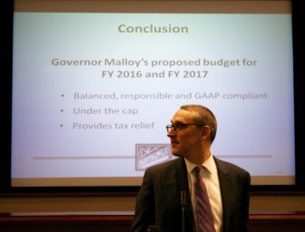 Ben Barnes, Gov. Malloy's budget chief, briefs the press on the 2015 budget proposal.