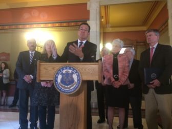 Gov. Dannel P. Malloy names Cameron Staples, at right, as chairman of his Transportation Finance Panel.
