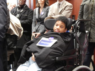 Dozens of people with disabilities and their families and people who work with them came to the state Capitol complex April 8 to protest human service budget cuts.