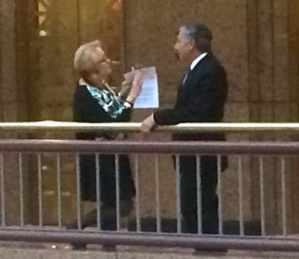 Rep. Minnie Gonzalez talking recently to Sen. Len Fasano about the confirmation of Chief Justice Chase T. Rogers.