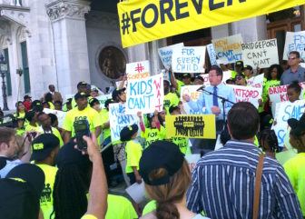 Gov. Dannel P. Malloy addresses a rally of charter school supporters at the state Capitol Thursday.
