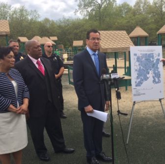 Gov. Dannel P. Malloy in New Haven with, from left, Mayor Toni Harp and NAACP President Scott Esdaile. The map shows how so-called school zones blanket the city.