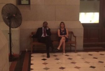 Sen. Eric Coleman, a lead sponsor of the police accountability bill, discusses the measure with House GOP leader Themis Klarides, She refused to back the bill.