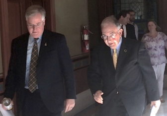 House Speaker J. Brendan Sharkey and Senate President Pro Tem Martin Looney on their way to a press conference after learning of Malloy's proposal to roll back business taxes.