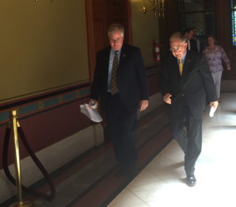 House Speaker J. Brendan Sharkey and Senate President Pro Tem Martin Looney on their way to a press conference after learning of Malloy's plan.