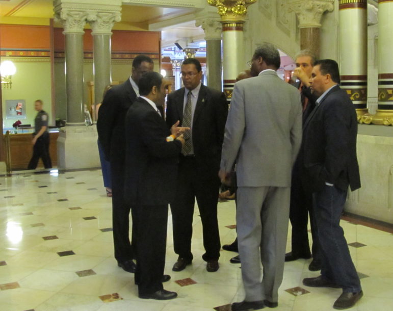 The Black and Latino Caucus outside the House, talking about "An Act Concerning Excessive Force."