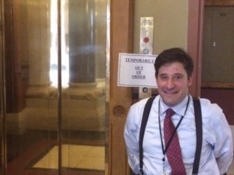 Jonathan Slifka, with the elevator plays a role in determining what access the disabled have at the Capitol.
