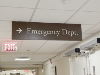 This is a picture of a sign pointing to the emergency department at Middlesex Hospital.