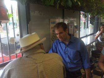 Luke Bronin campaigning on Park Street, the heart of the city's Puerto Rican community.