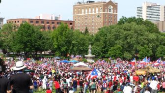 Puerto Rican Day festival gathering in Hartford's Bushnell Park in June.