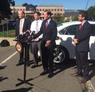 Sen. RIchard Blumenthal with, from left, Bruce E. Newman, Drew Mizak, Cory Guarnieri and Mizak's VW Passat.