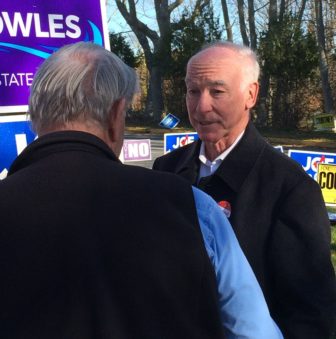 Courtney talks to Bill Spicer of Groton outside Fitch High School in Groton.