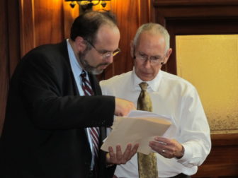 Mark Ojakian talking with then Education Commissioner Stefan Pryor on the floor of the state Senate during 2012