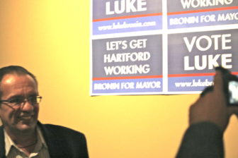 Former Hartford Mayor Eddie Perez smiles for a photo at the Bronin victory party election night.