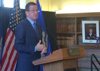 Gov. Dannel P. Malloy speaking at the UConn law school Friday.