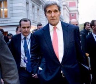 Brett McGurk, left, with Secretary of State John Kerry in Vienna during talks with stakeholders about the Syrian refugee crisis.