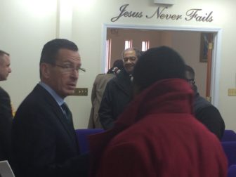 Gov. Dannel P. Malloy exits the Citadel of Love, a church where he outlined his Second Chance 2.0.
