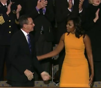 Gov. Dannel Malloy is greeted by First Lady Michele Obama as she enters the gallery.
