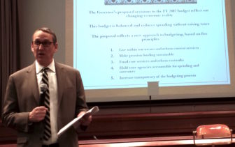 Budget director Benjamin Barnes briefs reporters on the administration's proposed budget.