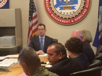 Gov. Dannel P. Malloy at a briefing on Zika. Dr. Raul Pino is second from left.