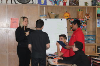 Students are taught a lesson in a class for English Language Learners at East Hartford Middle School