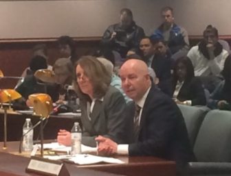 Karen Buffkin and Michael P. Lawlor facing the Judiciary Committee.