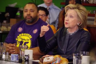 Presidential hopeful hillary Clinton speaks with a small crowd at Orangeade, a New Haven restaurant Saturday. At left is Terrell Williams, a New Haven native who works as a certified nursing and patient care assistant.