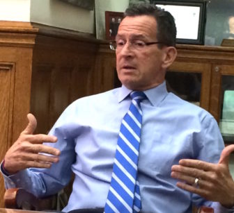 Gov. Dannel P. Malloy assesses the state if budget negotiations for reporters Friday night.