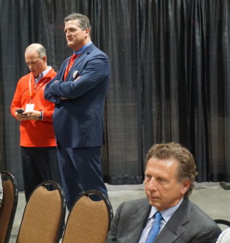 Jack Orchulli, seated, and August Wolf watch the voting go against them.