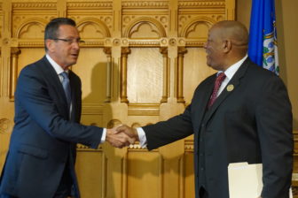 Gov. Dannel P. Malloy and Scott X. Esdaile of the NAACP.