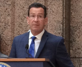Gov. Malloy answers questions after a meeting of the State Bond Commission Friday.