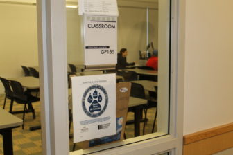 Hundreds of high school students participate in dual-enrollment college programs around the state. This one, in Manchester at Great Path Academy, is not among those approved for the new federal money for low-income students.