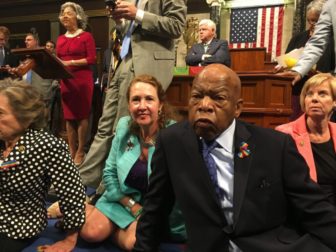 John Lewis, center, and John Larson, rear, organized a sit-in. At left, Elizabeth Esty.