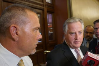 House Speaker J. Brendan Sharkey, right, and House Majority Leader Joe Aresimowicz talk to reporters Thursday.