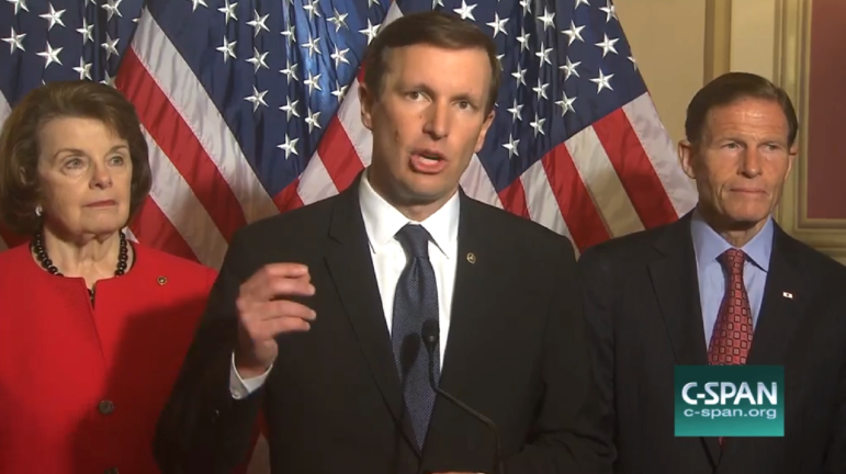 U.S. Sens. Diane Feinstein, Chris Murphy, at podium, and Richard Blumenthal at a news conference Thursday to discuss their proposed gun legislation.