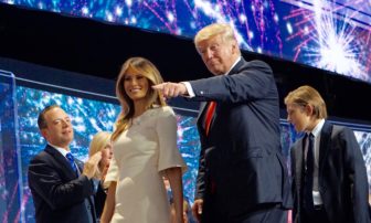 Donald J. Trump exits the stage with his wife, Melania