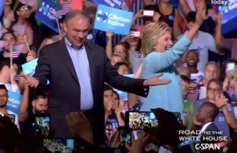 Virginia Sen. Tim Caine on stage with Hillary Clinton for the announcement of his selection as her vice presidential running mate.